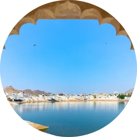 Sacred Pushkar Lake with ghats and hills, a top sight for luxury India trip