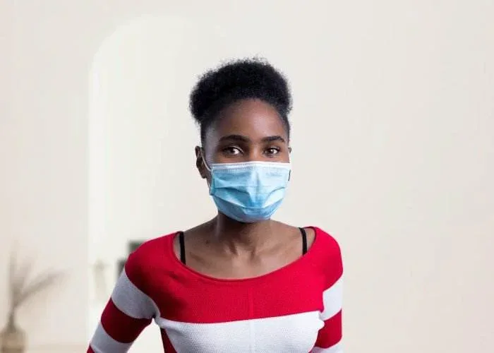 a girl with mask