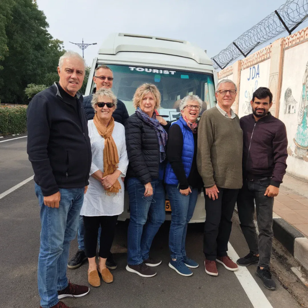 a group of peoples standing on a road