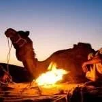 indian-men-resting-by-bonfire