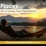 Traveler relaxing in hammock by river during Kerala sunset with scenic mountains